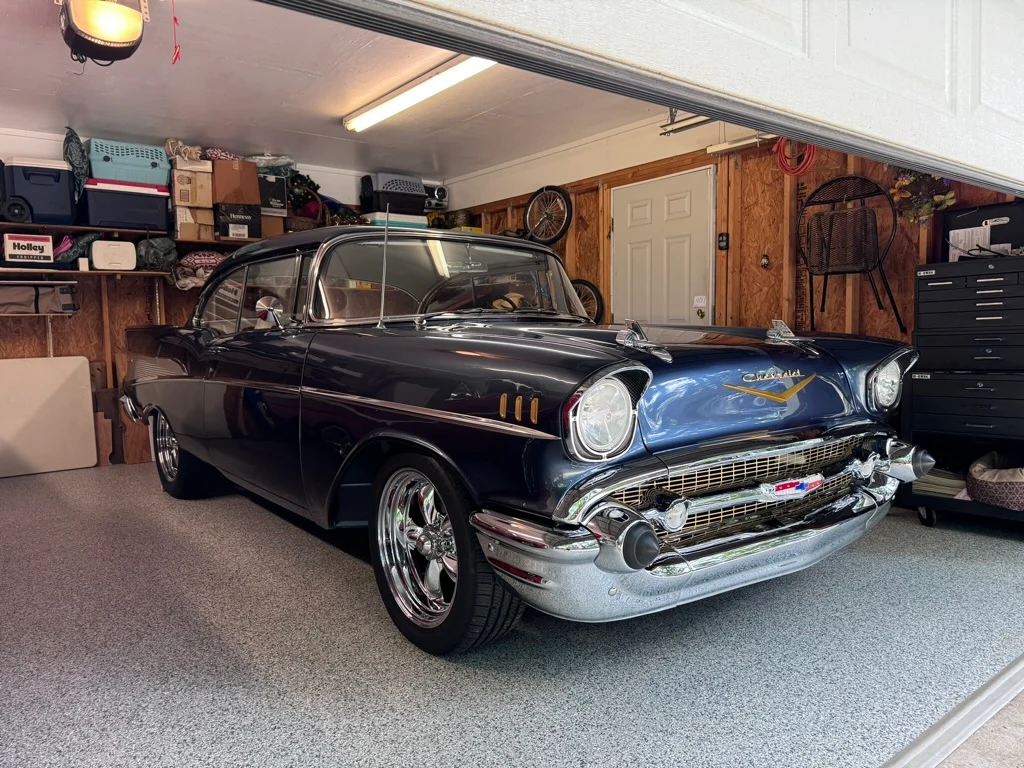 Classic blue car parked on a Diamond Coatings garage floor