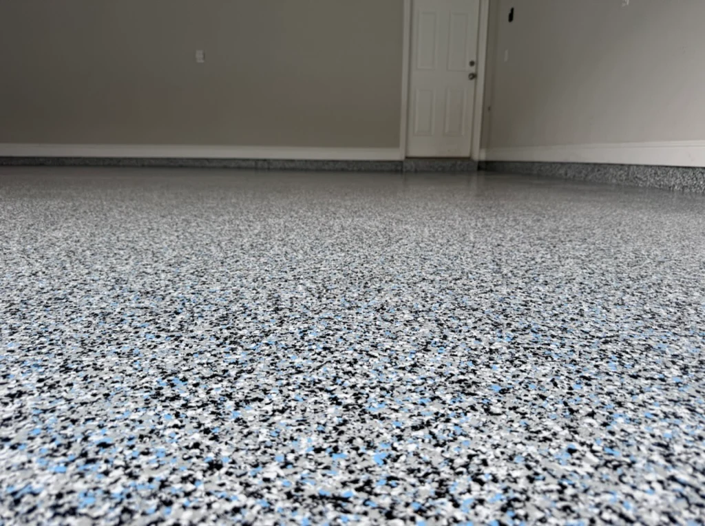 Close-up of a Diamond Coatings gray decorative flake floor