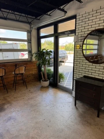 Sealed concrete at a brick-lined wedding venue entrance
