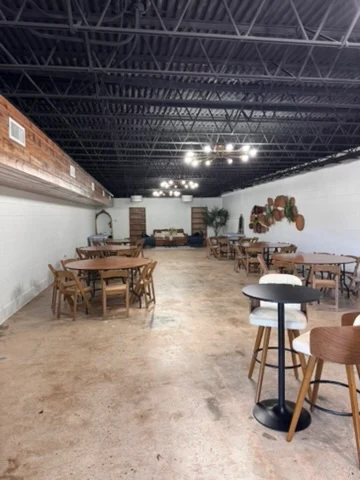 Grind-and-seal floor beneath wedding venue dining tables